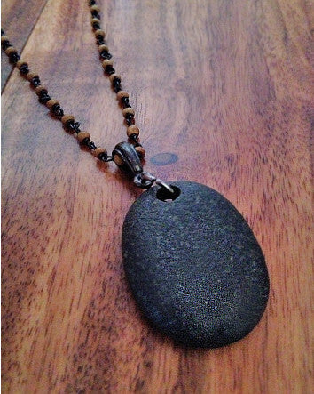 black quarried stone on delicate tea stained bone-linked chain