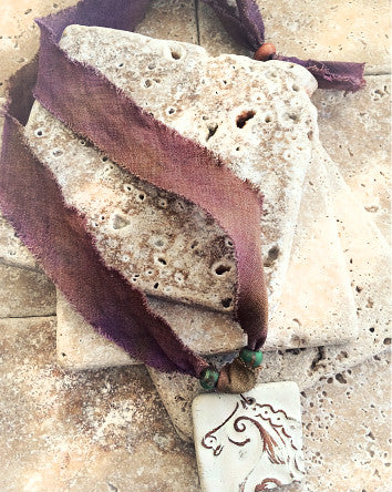cotton sari strips with pottery free spirit pendant