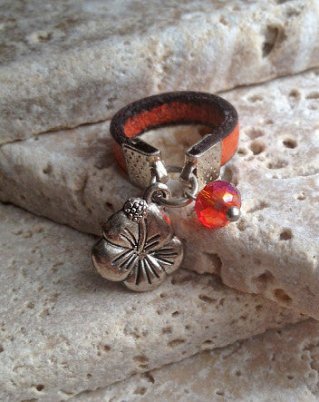 narrow leather and hawaiian flower ring