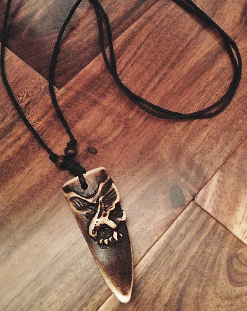 eagle-on-the-hunt oxbone pendant with black cotton cord | neckwear