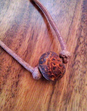 acid-etched coffee agate stone on a natural brown cord—feature | neckwear