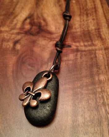 oxidized copper fleur de lis with black stone on copper rolo chain & leather cord