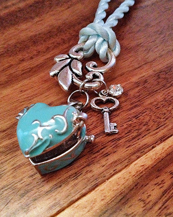 soft aqua heart locket with crystal & key on pale blue twist cord