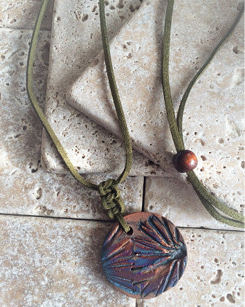 olive suede cord with raku pottery floral imprint pendant