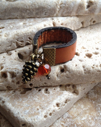 wide leather and pinecone ring—feature