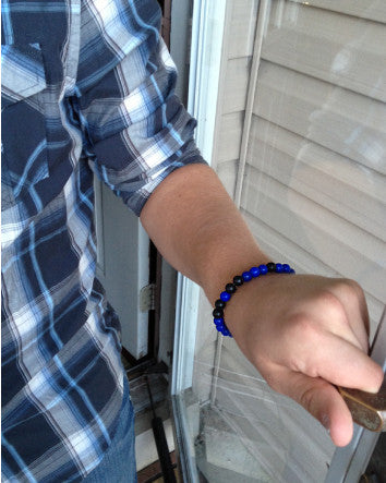 quaryd 8mm wristwear—with tru.gigs: matte black onyx & cobalt howlite with fleur de lys