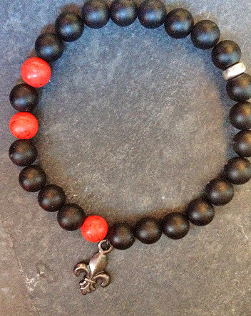 quaryd 8mm wristwear—with tru.gigs: matte black onyx & cardinal magnesite with fleur de lys