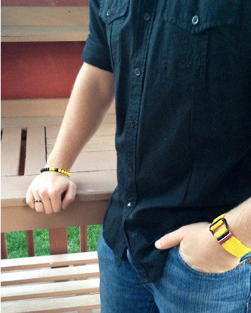 quaryd 8mm wristwear—with tru.gigs: matte black onyx & yellow magnesite with fleur de lys