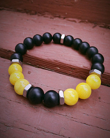 quaryd 10mm wristwear—with tru.gigs™: matte black onyx & sun jade with fleur de lys