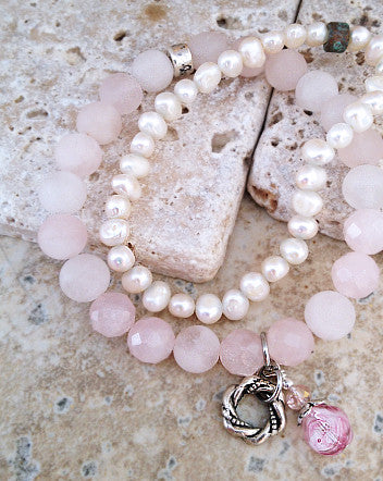 8mm quaryd bracelet with tru.gigs: rose quartz, eternity knot & swirled crystal drop-feature