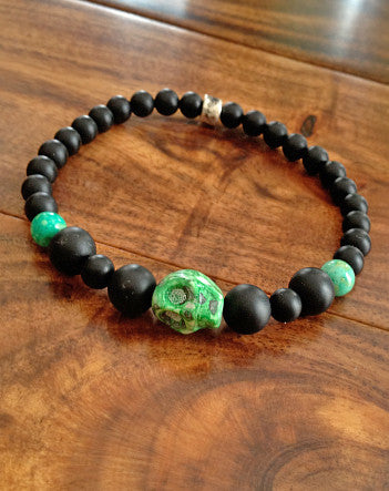 quaryd 6mm wristwear in matte black onyx with green howlite & hand-painted skull