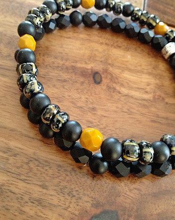 quaryd 6mm wristwear in matte black onyx with ochre stone & striped jet picasso-feature