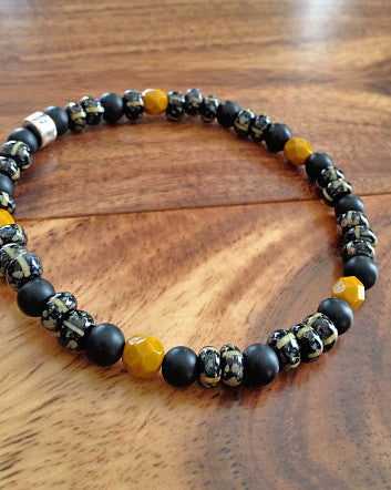 quaryd 6mm wristwear in matte black onyx with ochre stone & striped jet picasso-feature